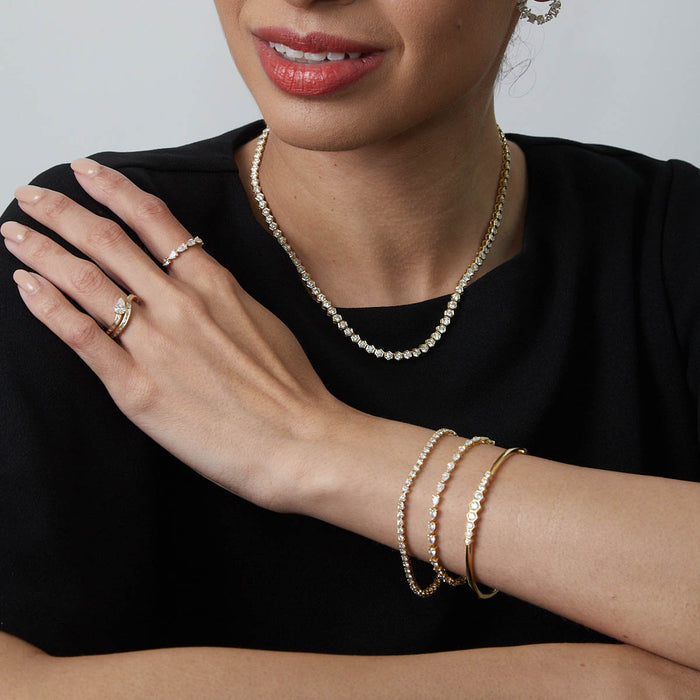 Pear & Baguette Diamond Curved Band